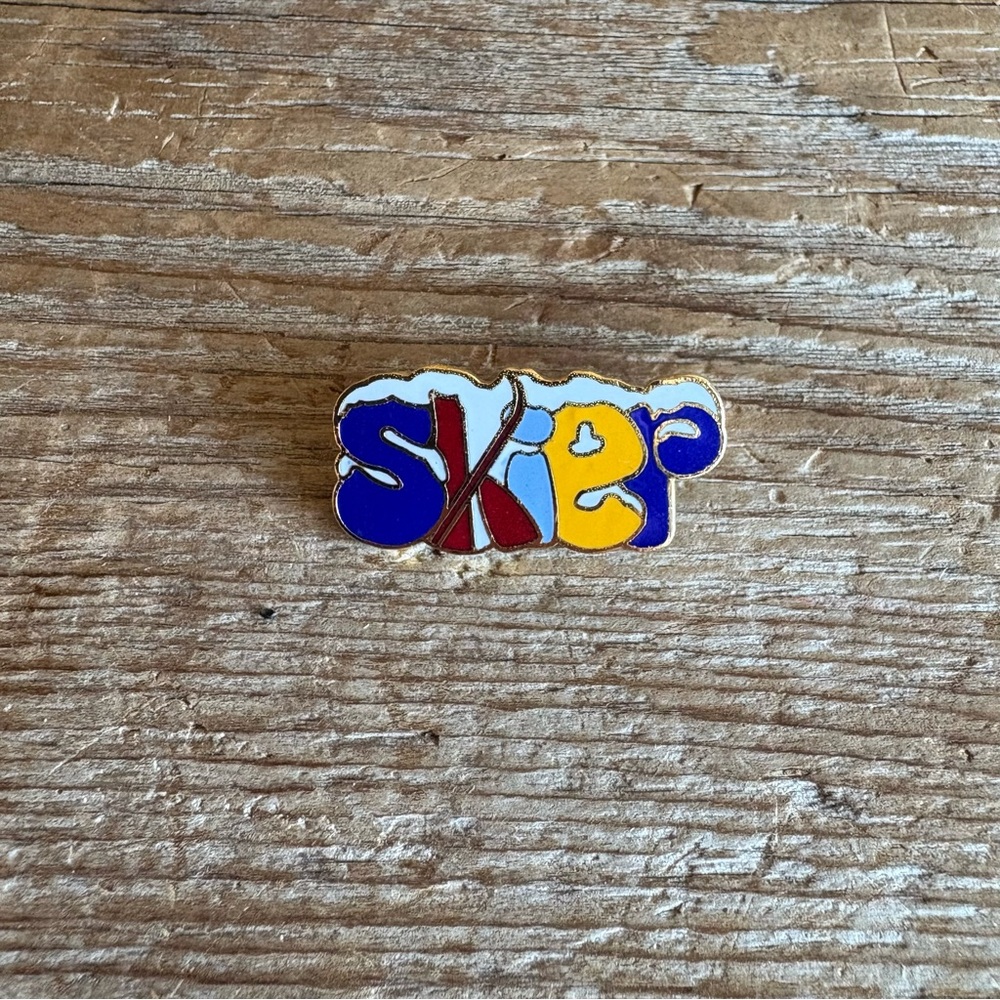 Colorful 'Skier' Enamel Pin - Blue, Red, Yellow